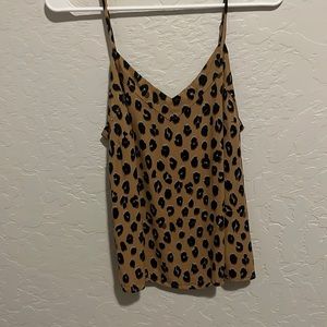 Cheetah tank size medium. Brand a new day